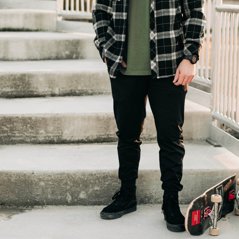 Lifestyle photo showcasing TD Tactical EDC Joggers in action, highlighting their concealed carry capability, athletic fit, and all-purpose comfort for range, gym, or everyday wear